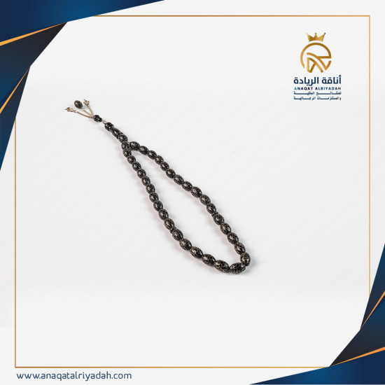 سبحة خشب سر مطعم بالفضة مع كتلة فضة 