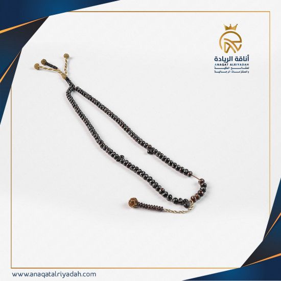 سبحة خشب يسر مطعم بالفضة 