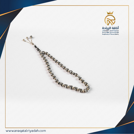 سبحة خشب يسر مطعم بالفضة 002