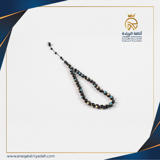 سبحة خشب كوك مطعم بالفيروز و العظم 001