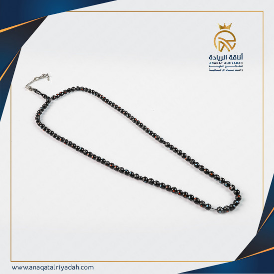 سبحة خشب يسر مطعم معدن والمرجان و الفيروز 