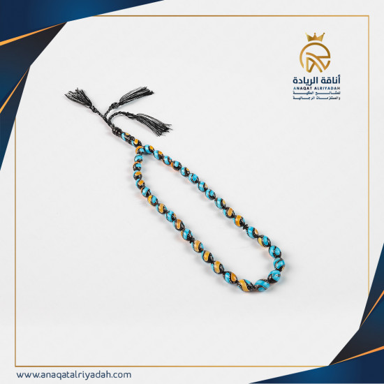 سبحة خشب كوك مطعم بالفيروز و الكهرمان