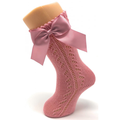 جوارب طويلة مخرم لون وردي موديل فيونكة جوارب طويلة مخرم لون وردي موديل فيونكة