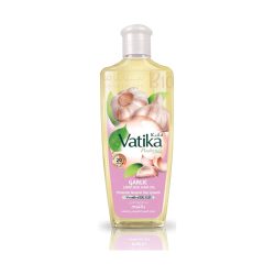 Vatika Garlic Hair Oil helps to grow hair naturally and reduce the problem of breakage - 400 ml