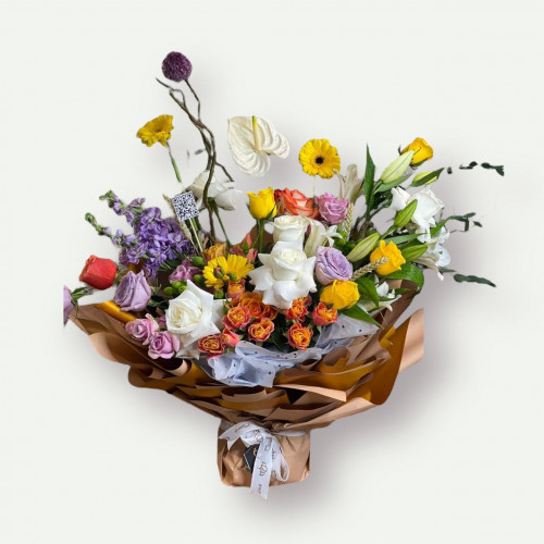 باقة جالسة مبهجة باقة جالسة مبهجة