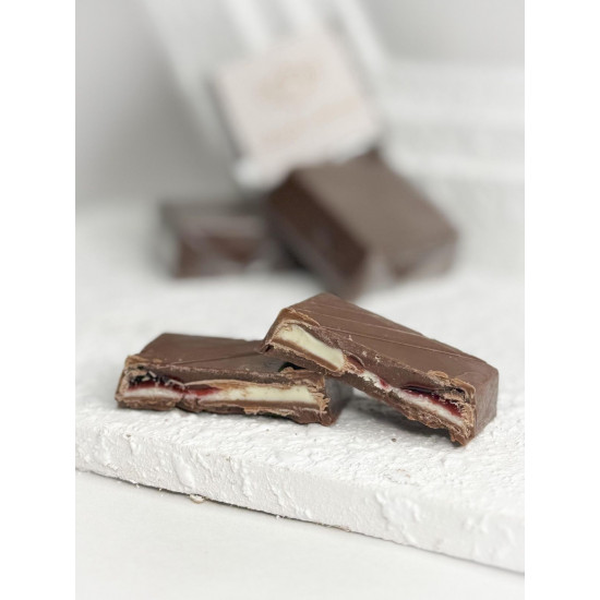 شوكليت بلجيكي بالمذاق الفريد ممزوج بحشوة الرمان الطازجة