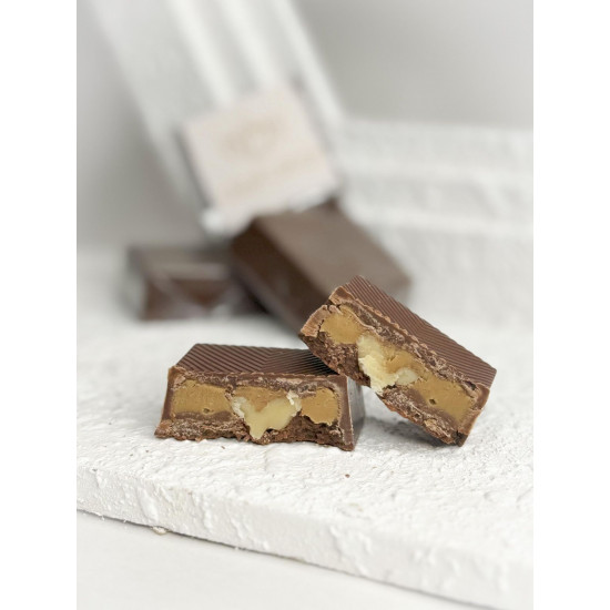 شوكليت بلجيكي بالمذاق الفريد ممزوج بحشوة البيكان 