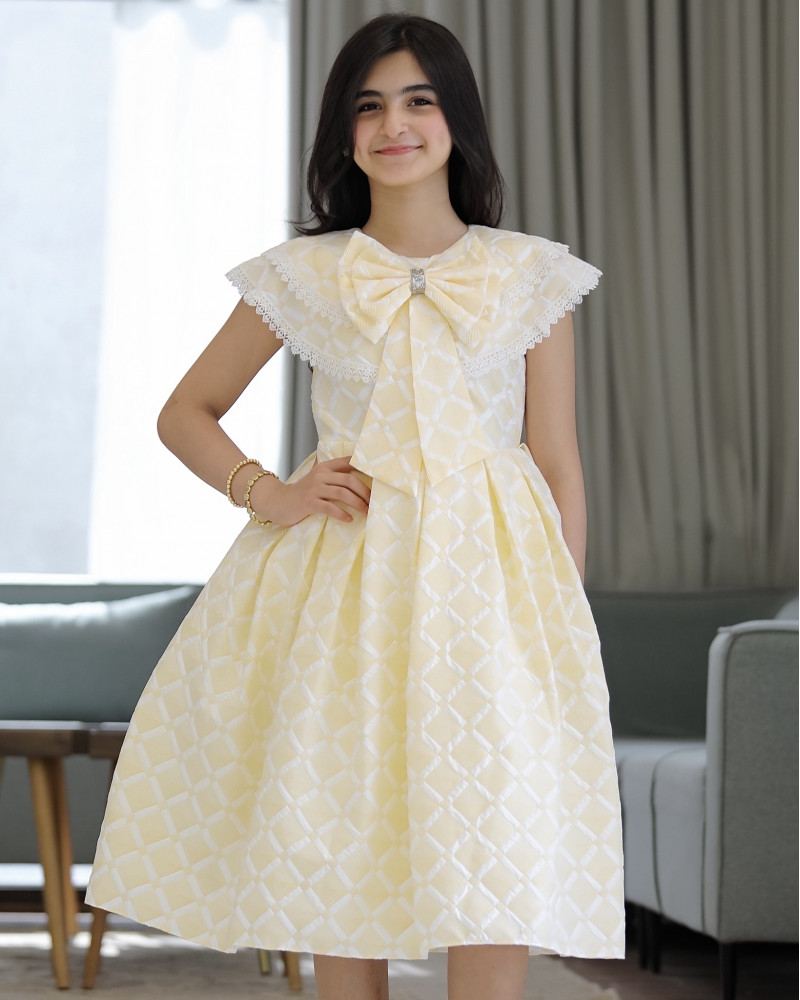 فستان بناتي الاصفر بفيونكه وحزام انيق - 901 فستان بناتي الاصفر بفيونكه وحزام انيق - 901