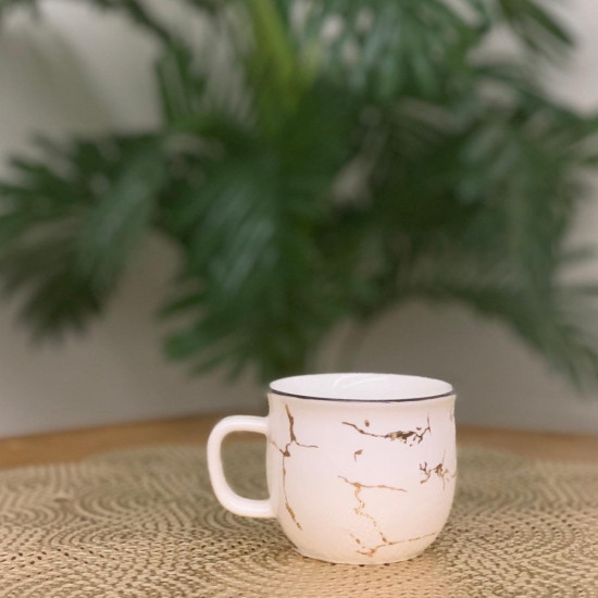 كوب قهوة سيراميك أبيض وذهبي