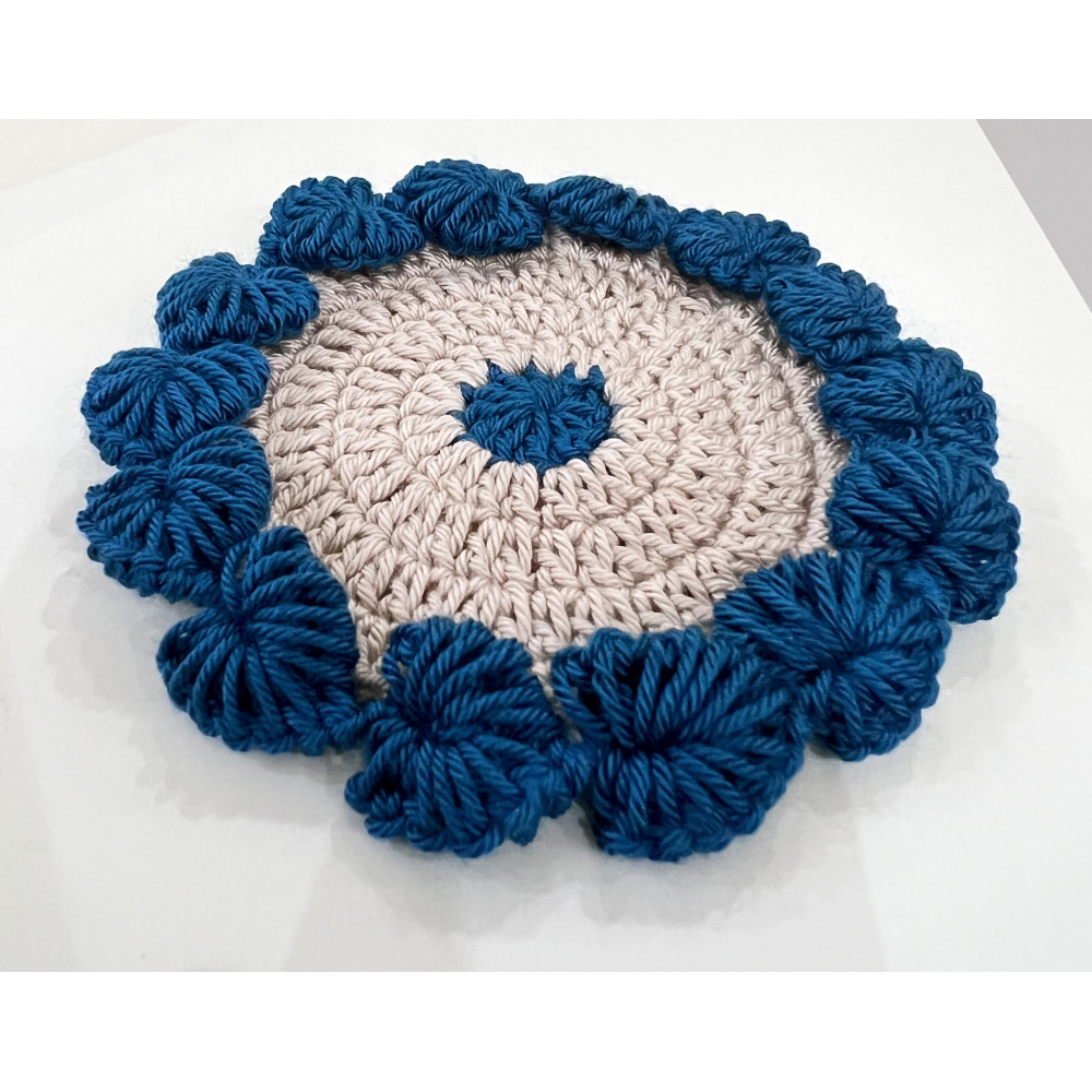 قاعدة كاسة من الصوف 