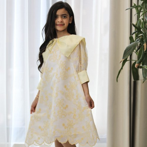 فستان بناتي أصفر مشجر بدلعة وأكمام شفافة - 1134 فستان بناتي أصفر مشجر بدلعة وأكمام شفافة - 1134