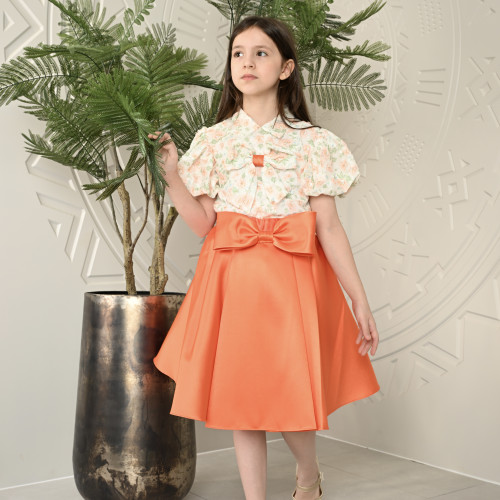 طقم تيور بناتي برتقالي بأكمام منقوشة طقم تيور بناتي برتقالي بأكمام منقوشة