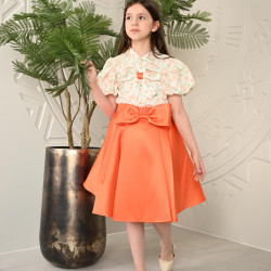 طقم تيور بناتي برتقالي بأكمام منقوشة طقم تيور بناتي برتقالي بأكمام منقوشة