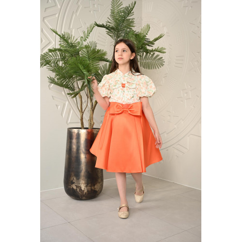 طقم تيور بناتي برتقالي بأكمام منقوشة طقم تيور بناتي برتقالي بأكمام منقوشة