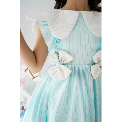 فستان بناتي سماوي بفيونكات | تصميم مقلّم - 1013 فستان بناتي سماوي بفيونكات | تصميم مقلّم - 1013