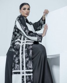 عباية ديور عملية باللونين الأبيض و الأسود