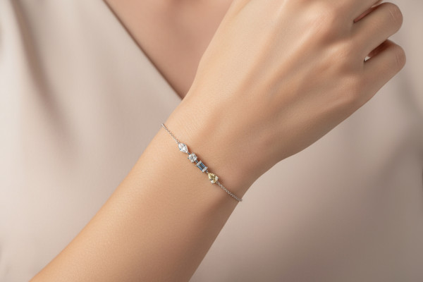 أسوارة فضة مطلية بالذهب الأبيض مرصعة بحجر الزركون الأبيض والأصفر أسوارة فضة مطلية بالذهب الأبيض مرصعة بحجر الزركون الأبيض والأصفر