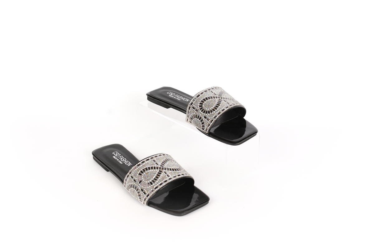 حذاء مسطح بواجهة مزخرفة