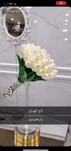 مسكه عروس ورد توليب مع ربطة لولو ب 350ريال مسكه عروس ورد توليب مع ربطة لولو ب 350ريال