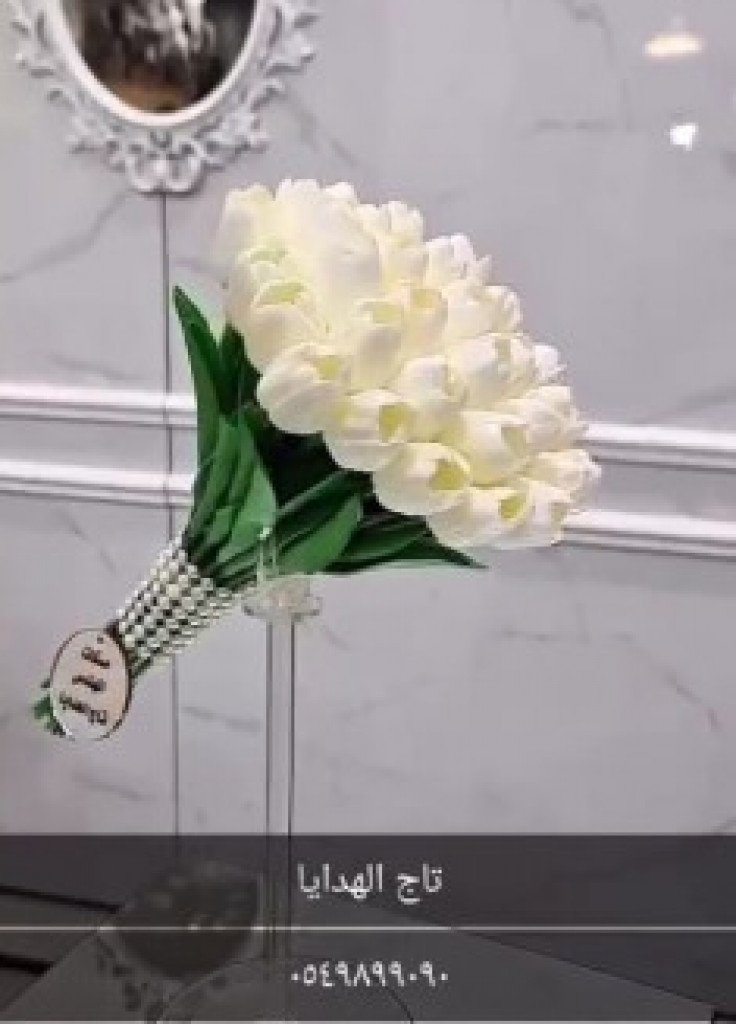 مسكه عروس ورد توليب مع ربطة لولو ب 350ريال مسكه عروس ورد توليب مع ربطة لولو ب 350ريال